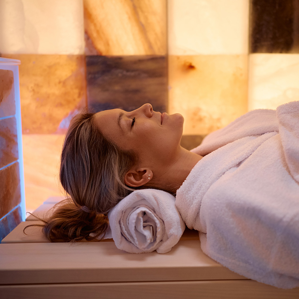 Woman Relaxing In Salt Room